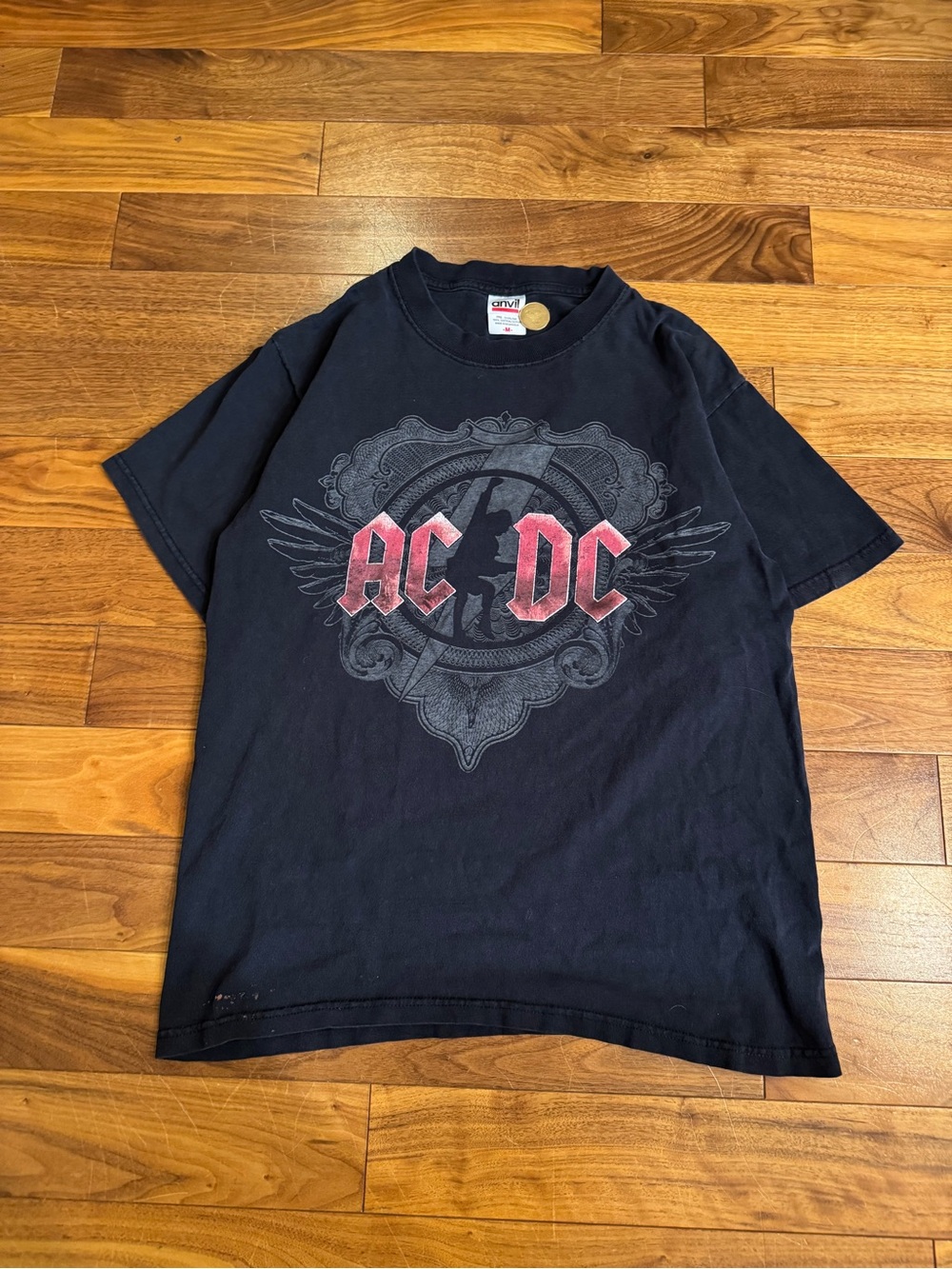 Anvil Black Graphic Crewneck Tee with Subtle Embossed Design